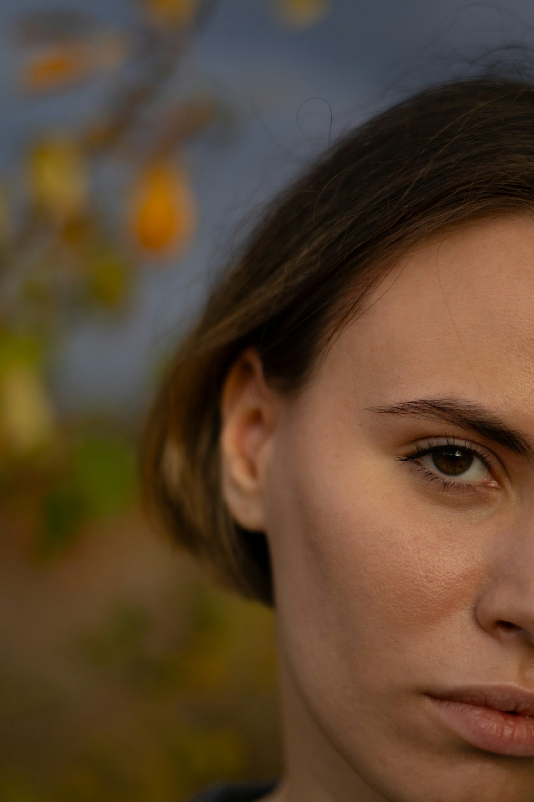 a close up of a person with a cell phone